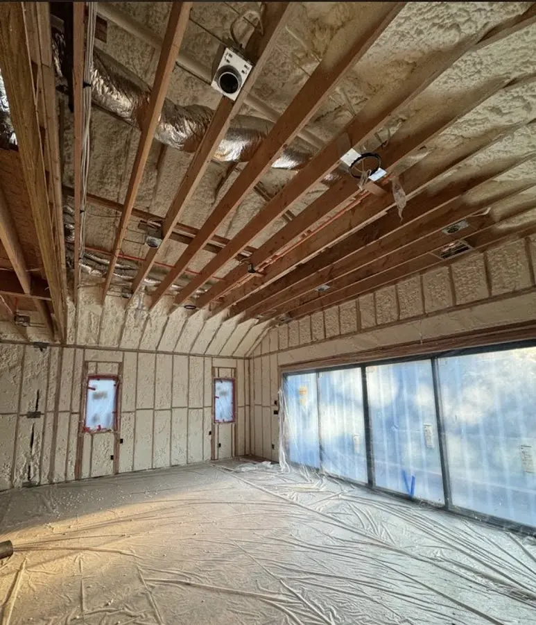 Interior walls and ceiling insulated with spray foam during new construction in Gunbarrel